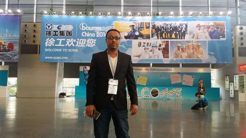 KI founder at an international machinery exhibition