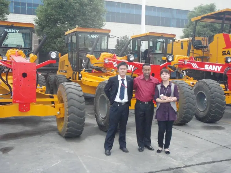 Engineer Kedir Ibrahim with SANY representatives during a construction-machinery facility visit