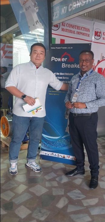 Mr. Kedir Ibrahim with a South Korean Power Trader partner